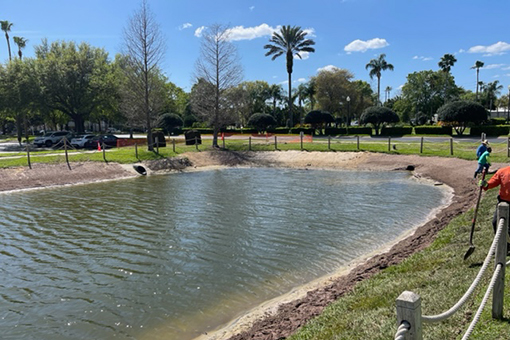 Ongoing Pond Restoration Being Done by Three Workers from a Kissimmee Company