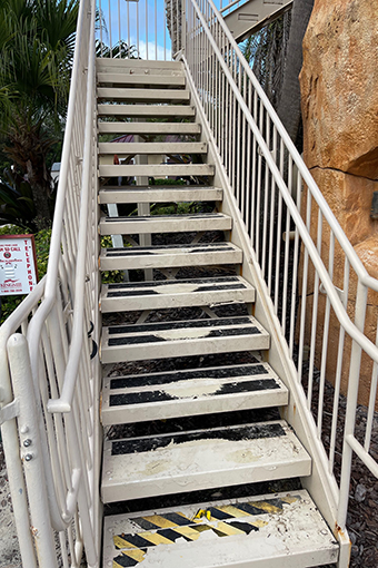 Paint Peeling Off Stairs Up for Repaint from Kissimmee Repair Company