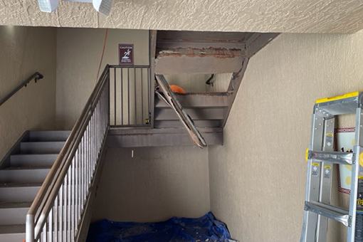 Stairs with a Broken Step to be Serviced by a Kissimmee Construction and Repair Company
